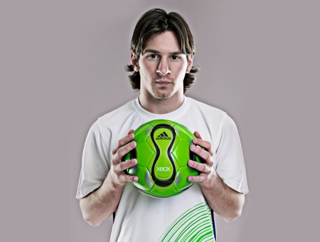 Soccer Player Holding A Ball