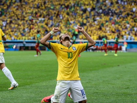 Man In Yellow 10 Jersey Top Kneeling On Soccer Field