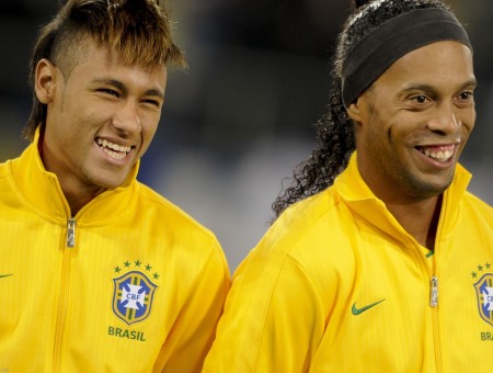 2 Soccer Player In Yellow Jacket Smiling