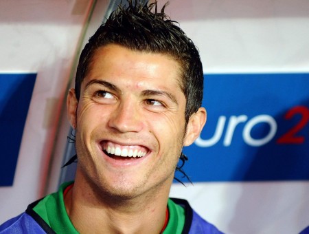 Cristiano Ronaldo In Green And Blue Shirt Smiling