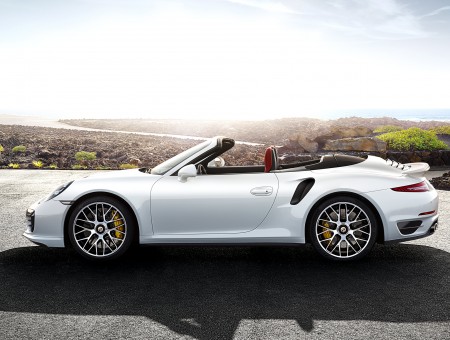 White Porsche 911 Turbo S Cabriolet Parked On Road