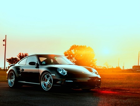 Black Porsche 911 At Sunset