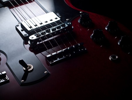 Red And Black Electric Guitar