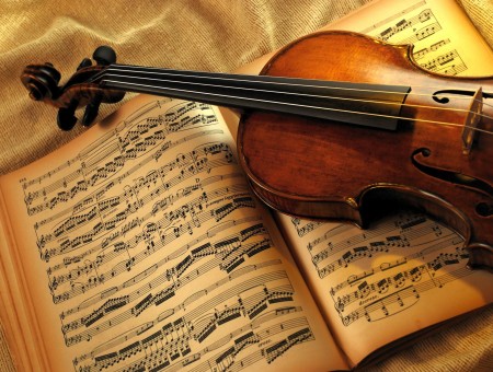 Brown Violin On Brown Musical Score