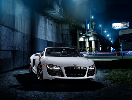 White Audi R8 Spyder Parked Besides Building During Nighttime