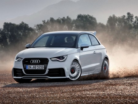 White Audi A3 Hatchback Drifiting Through Dirt
