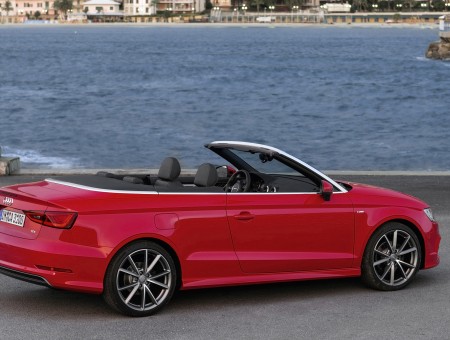 Red Audi Convertible Parked At The Harbor