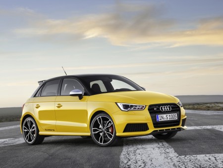 Yellow Audi S1 Sportback Parked On Road During Daytime