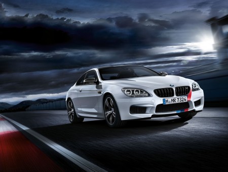 White BMW M6 On Road In Panning Photography Under Cloudy Sky During Daytime