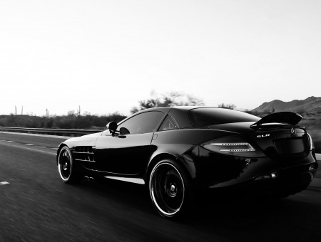 Grayscale Photography Of Sports Car On Road