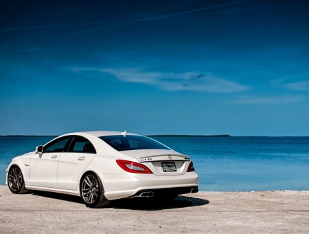 White Mercedes Benz CLS Class By The Sea