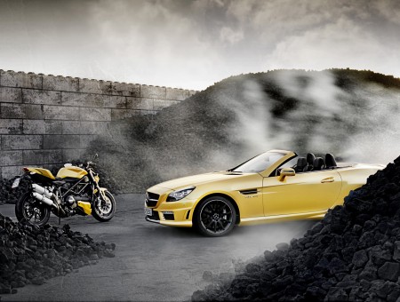 Yellow Mercedes Benz Convertible In Front Of Yellow Sports Bike
