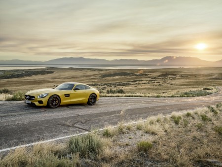 Yellow Sports Car On Winding Road