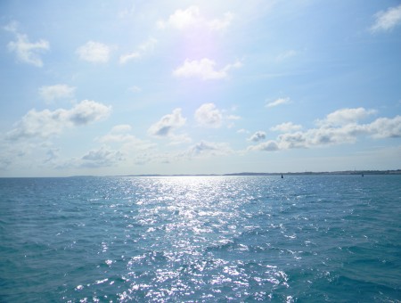 Blue Calm Sea Water Under Blue Sky During Daytime