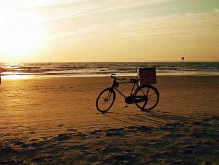 Bike With Box At The Box In Shore During Sunset