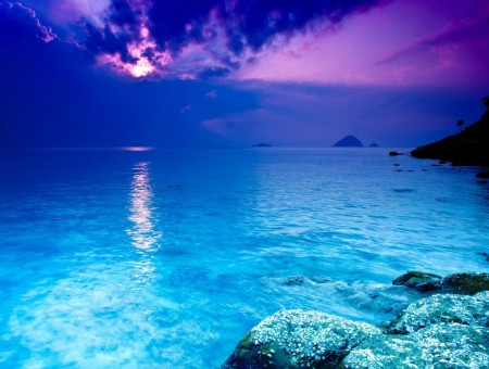 Blue Body Of Water With Pink Sky