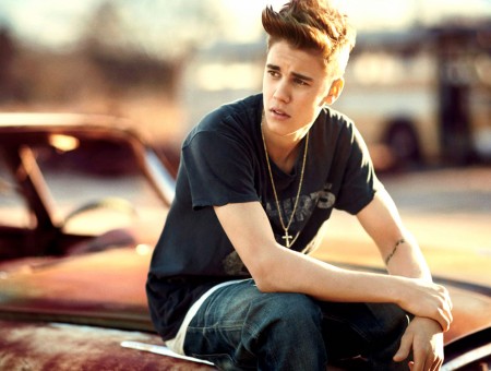 Justin Bieber Sitting On Brown Classic Car