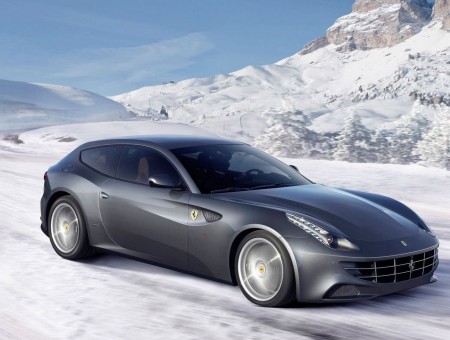 Gray Ferrari On Road Covered With Snow During Daytime