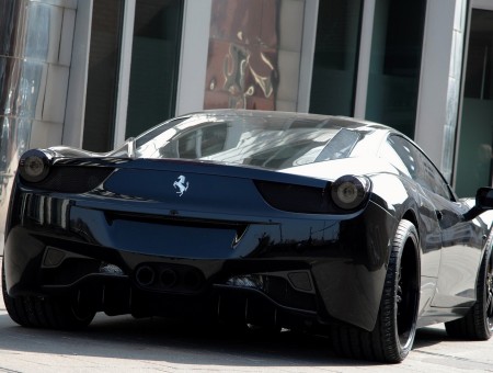 Black Ferrari 458 Italia Parked In Front Of Building