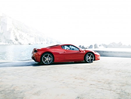 Red Ferrari 458 Italia On Lakeside During Daytime