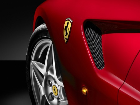 Red Ferrari Emblem On Side