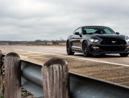 Black Ford Mustang On Road During Daytime