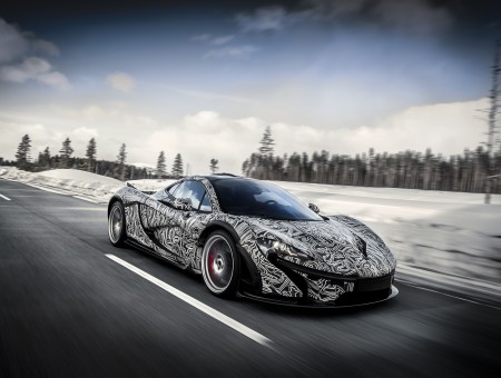 Grey And Black McLaren P1 On Road During Daytime