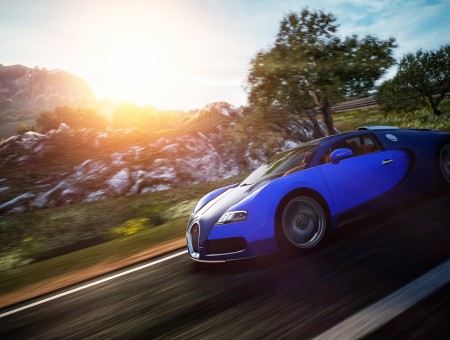 Blue Bugatti Veyron Speeding On Highway During Sunset