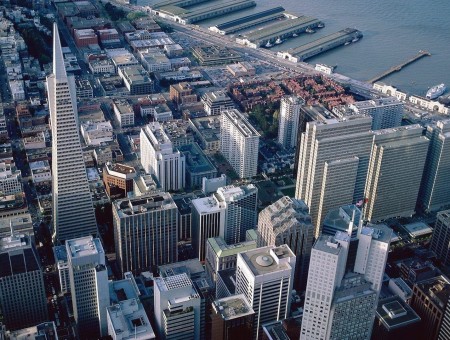 Aerial Photo Of Skyscrapers By The Shore During Daytime