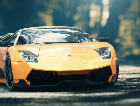 Yellow And Black Sports Car On Ground During Daytime In Bokeh Photography