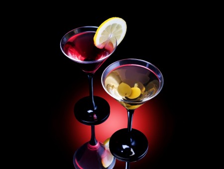 2 Martini Glasses With Red And Yellow Liquids