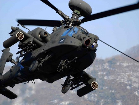 Black Apache Helicopter In Flight