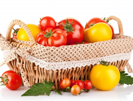 Orange Tomatoes Beside Yellow Tomatoes In Basket