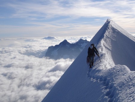 Man Crossing The Snoe Mountains