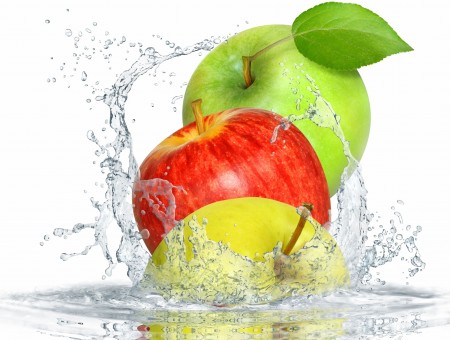 Red And Green Apple Fruit Falling On Water