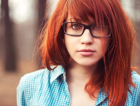 Woman Wearing Black Framed Eyeglasses Posing
