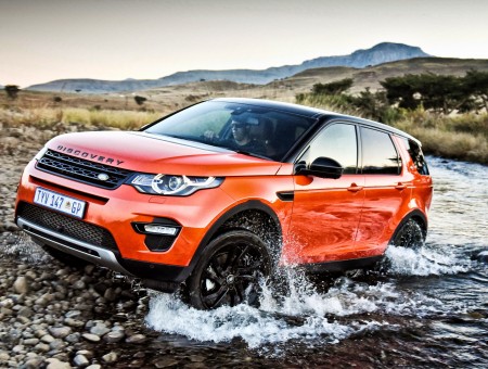 Orange Land Rover off-road
