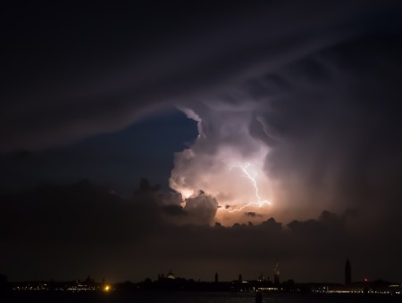 Thunderstorm in the dark sky