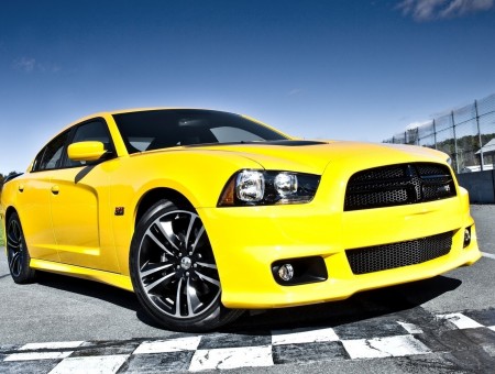 Yellow Dodge Changer on race track