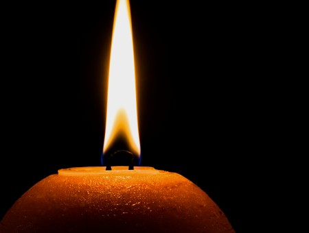 Candle on dark