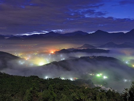 Fog and green light in mountains