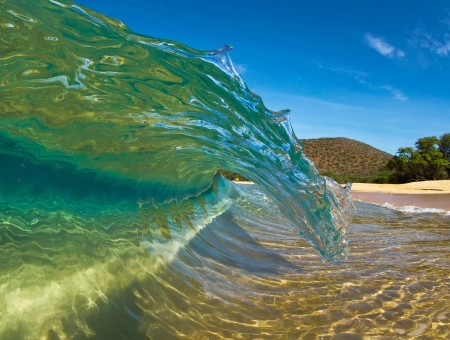 wave on sunny beach