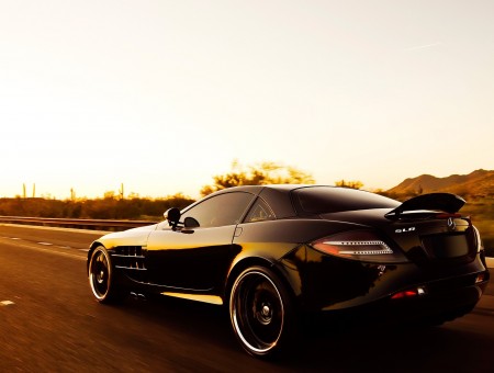 black mercedes on the road
