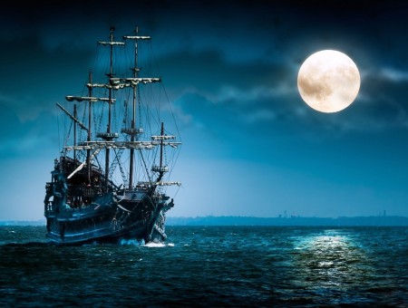 ship in sea and moon