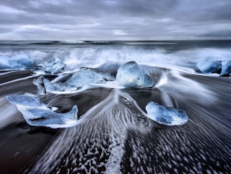 sea and ice stones on coast