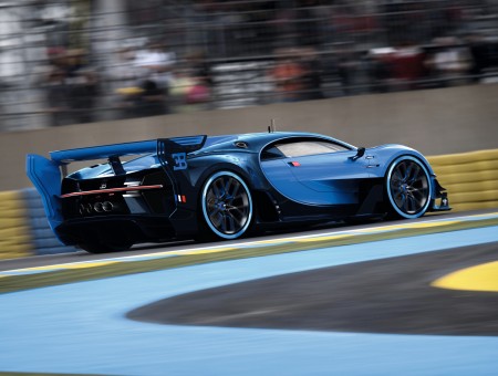 Blue and black car in race