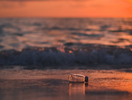 Bottle on sea coast