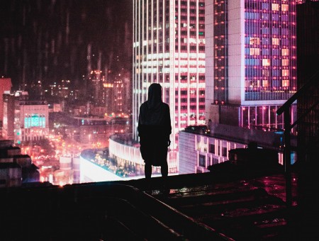 Silhouette on night city background