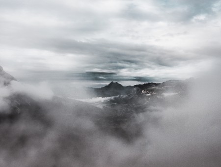 Fog shroud above mountains