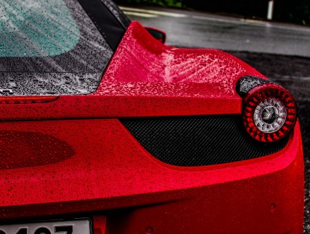 Drops on red Ferrari